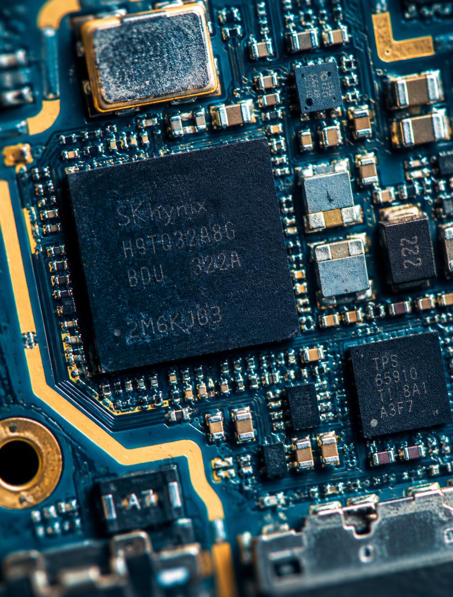 Extreme close-up of a phone motherboard's microscopic components
